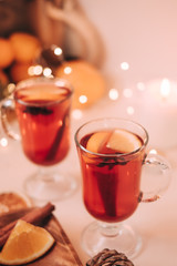 Atmospheric Christmas or New Year background with mulled wine. Close up of mulled wine, soft focus, shallow depth of field