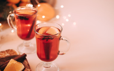 Atmospheric Christmas or New Year background with mulled wine. Close up of mulled wine, soft focus, shallow depth of field