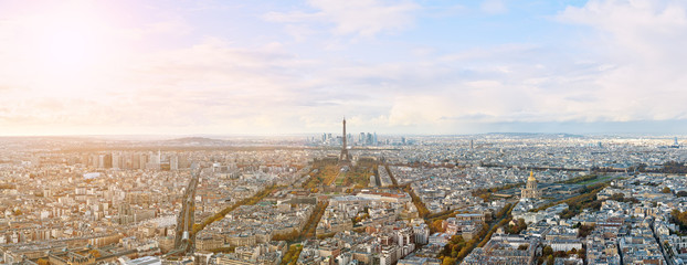 Eiffel tower and Paris city view form Montparnasse tower panorama. Sunny autumn day. Aerial panormic view of Paris skyline.