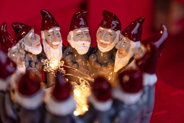 Gnomes.Christmas lantern for a candle and a burning candle