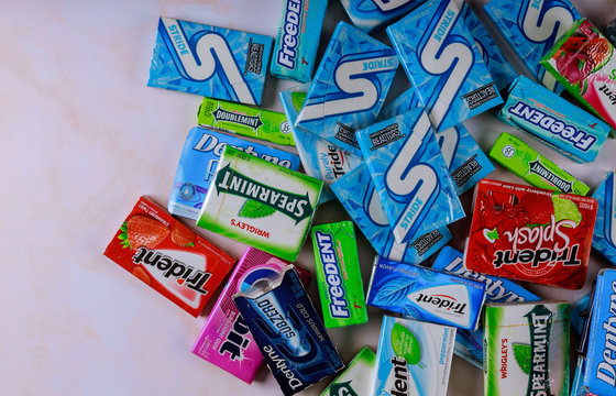 Various brand of chewing gum in packaging on brands Orbit, Extra, Eclipse, Freedent, Wrigley, Spearmint, Trident, Stride