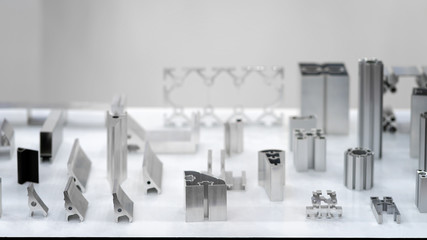 Pile of aluminum automotive parts, casting process in the automotive factory