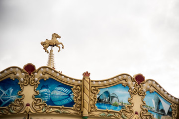 Fototapeta na wymiar Classic merry-go-round or carousel at the winter fair