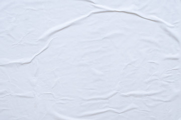Blank white crumpled and creased paper poster texture background