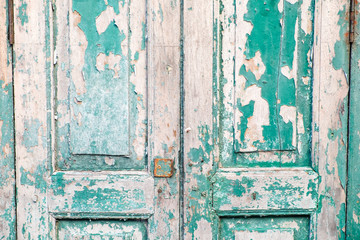 Old wooden door, green, black ground texture