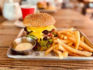 burger and french fries on a food tray