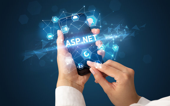 Female hand holding smartphone with ASP.NET inscription, modern technology concept