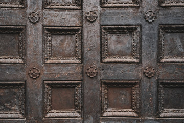 Black wrought iron openwork vintage metal doors