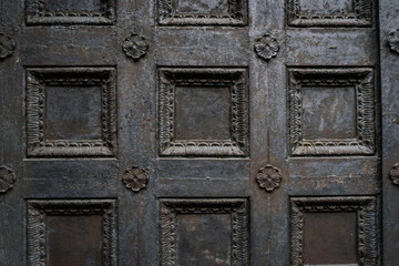 Black wrought iron openwork vintage metal doors