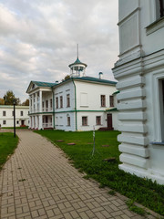 Fototapeta na wymiar Estate of the russian poet in the Yaroslavl region from several white houses