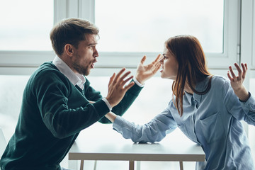 man and woman shaking hands