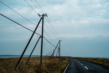 Fototapeta na wymiar 野付半島の道路と電柱