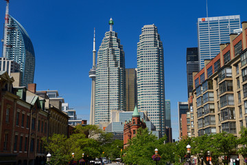 Gooderham Flatiron building with financial district bank towers L tower and CN tower Toronto