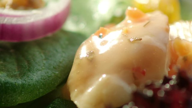 Chicken breast gilled and sliced presented on mixed salad