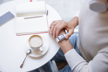 Close up of modern man that checking time