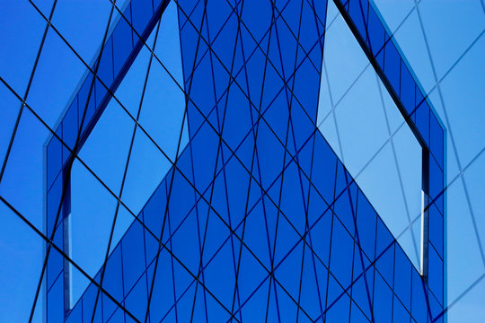 Collage photo of modern architecture fragment with glass wall, windows, ceiling or roof. Checkered transparent panels. Structural glazing. Abstract geometric background with grid pattern.