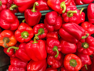 Red pepper on the counter. The texture of red pepper.