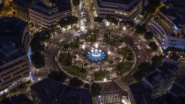 Big roundabout - Aerial hyperlapse - Dizengoff square in tel Aviv, Israel, at night, 4k drone view