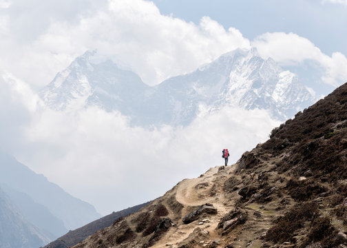 Young man trekking in the Himalayas, Solo Khumbu, Nepal