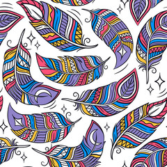 Vector seamless pattern with colored abstract feathers. Hand draw cartoon illustration. Freehand doodles.