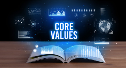 CORE VALUES inscription coming out from an open book, creative business concept
