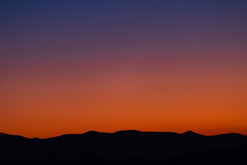 evening sky at sunset the color of lush lava