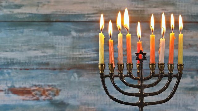 Lighting the eight candles in the menorah chanukah is the Jewish festival of lights, celebrated with nightly menorah lighting