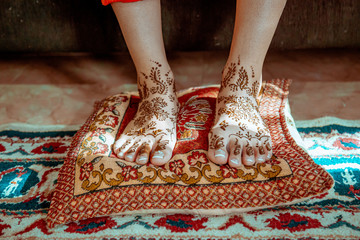 Henna tattoo on arm of Indian woman