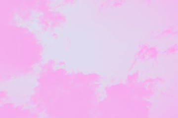 Obraz premium Pink clouds on a clear pink sky background. Copy space