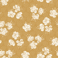Flower heads in off white tossed around with textured yellow background.