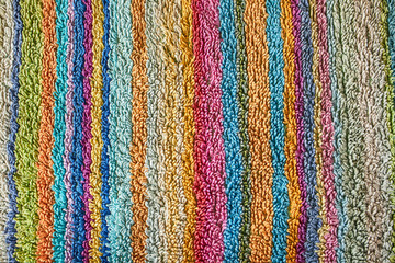 Fabric with vertical stripes of different colors