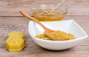 beeswax molds and pollen on white plate