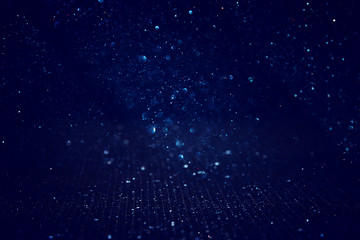 glitter classic blue lights background. de-focused. color of the year 2020