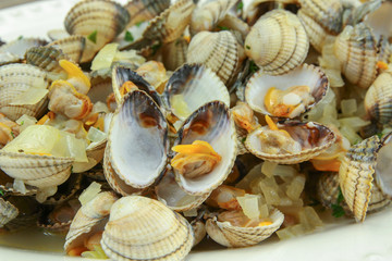 cockles cooked with white wine and onions