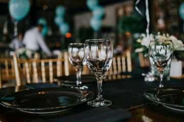 Beautiful colorful table decoration with glasses