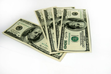 One hundred us dollar bill or banknotes on the white background