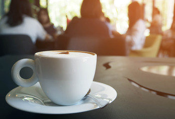 cup of coffee on table in coffee shop cafe