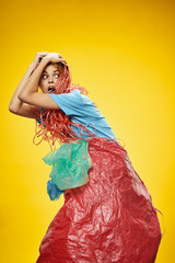 Woman with trash bags