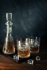 Fototapeta na wymiar Whiskey in glass with ice