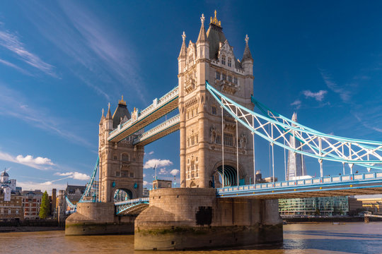 The tower Bridge in a sunny day in London with the shard and thames