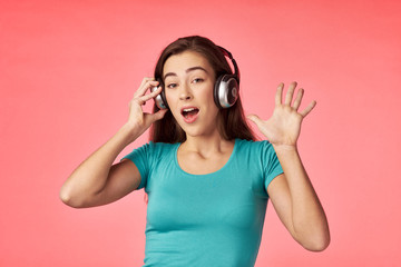young woman with headphones listening to music