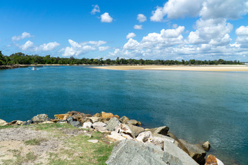 the beautiful beach of Noosa on the sunshine coast in Australia with beautiful weather and blue sky with white clouds