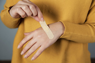 woman hand bandaged