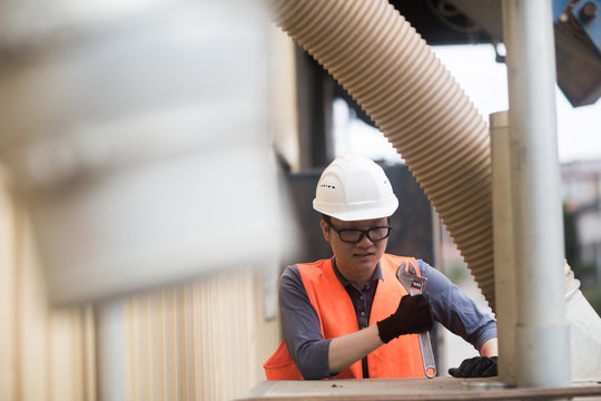 young worker in a concrete factory