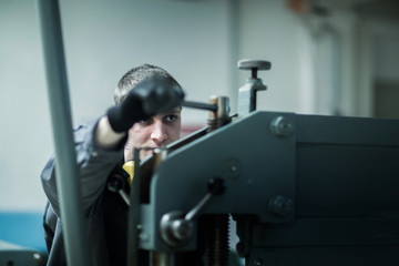 engineer in a workshop milling