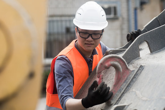 young worker in a concrete factory