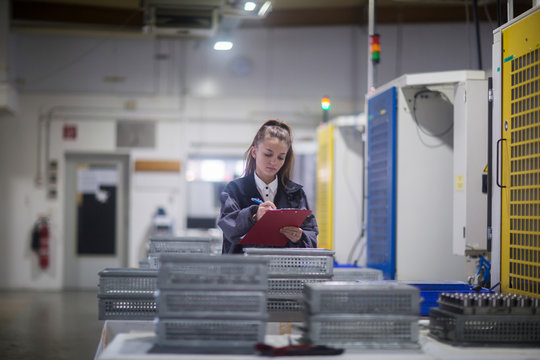 industrial plant with an engineer female
