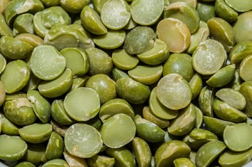 Background with peas in the foreground