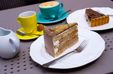 Cake with coffee in restaurant
