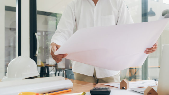 Architect or engineer working in office